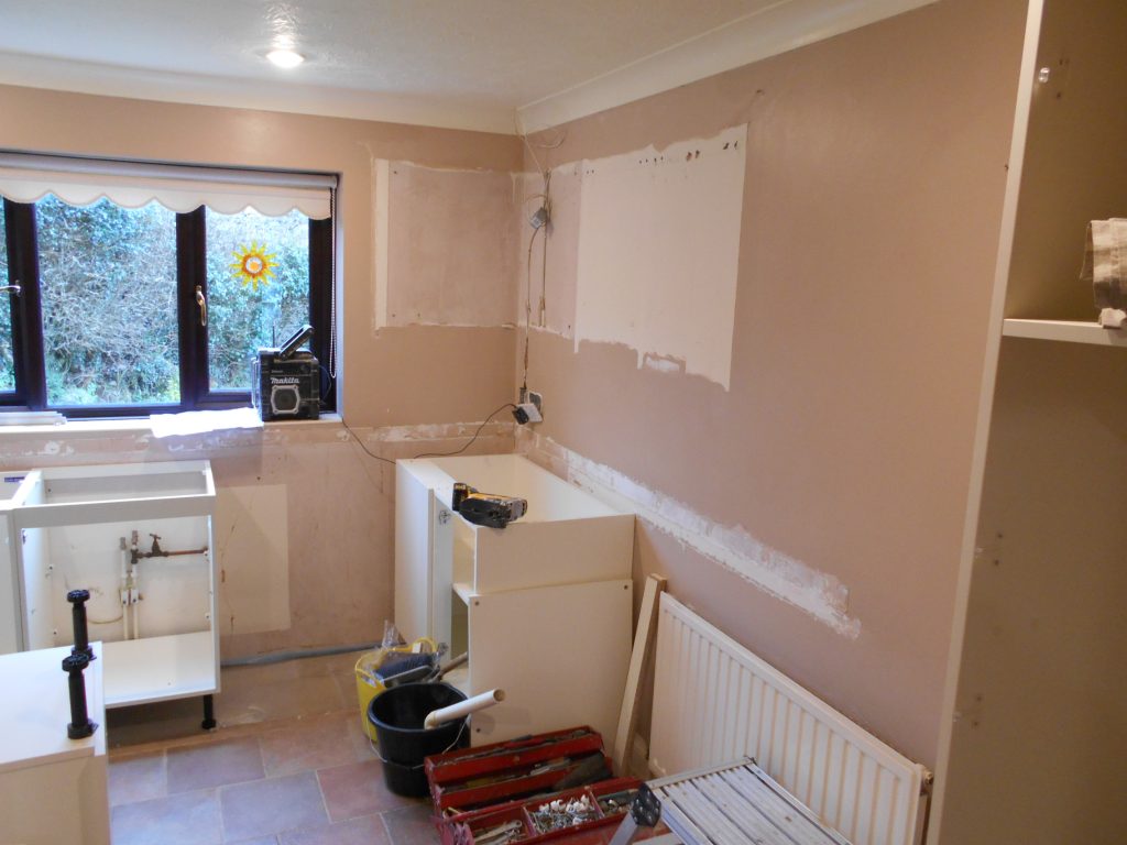 Old Base Units, Worktops and Tiles taken out
