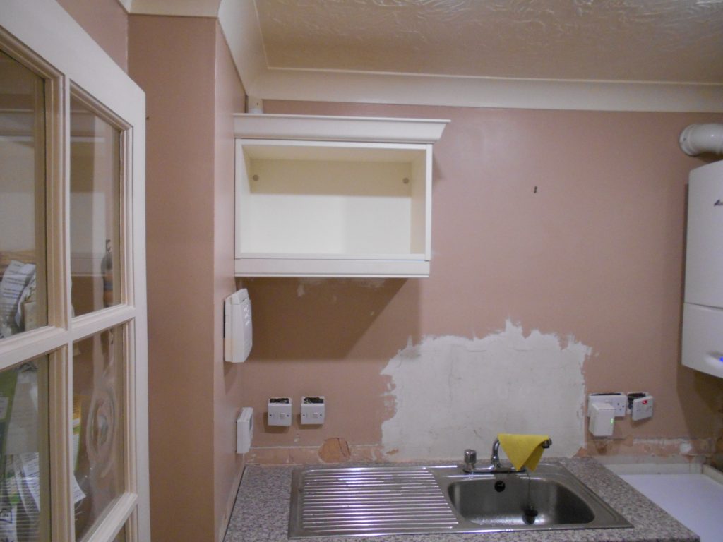 Keith Holder Kitchens Bookshelf in Utility Room