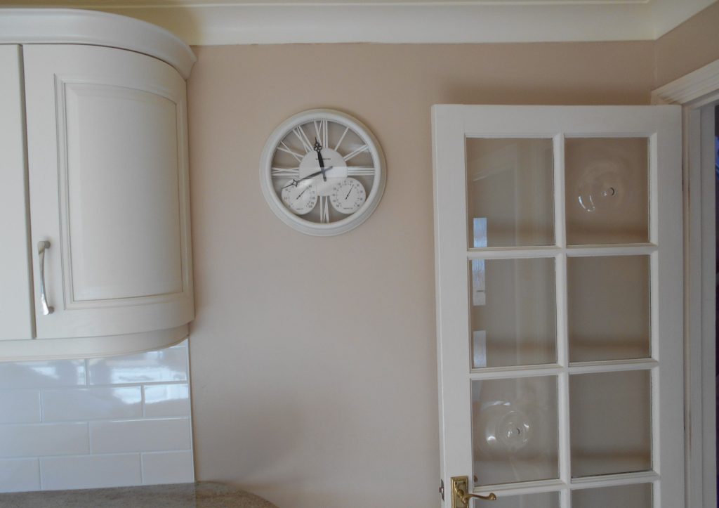 Final colour liquer paint on kitchen and utility walls and put up kitchen clock